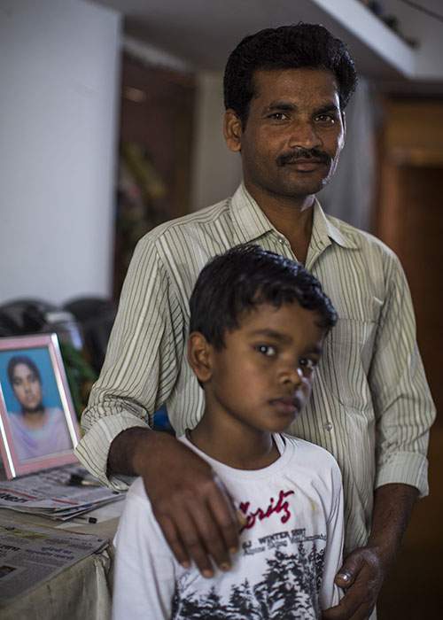 Dawlen Tirkey&#39;s husband, Manoj, and their son, Abhinaw