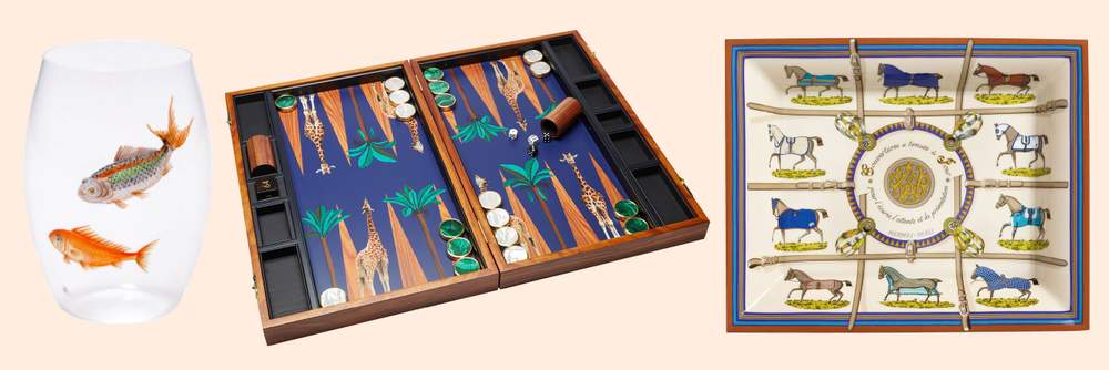 Lobmeyr Convex handpainted fish tumbler, £300 each, modaoperandi.com; Alexandra Llewellyn bespoke backgammon set, £4,656, exclusive to modaoperandi.com; porcelain tray, £385, hermes.com