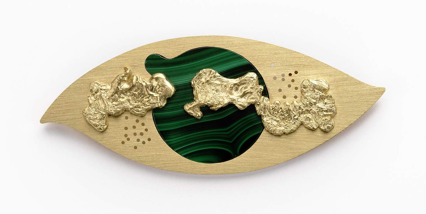 Man Ray ‘The Oculist, 1971’ brooch in 18 carat gold and machelite. Courtesy of the Louisa Guinness Gallery