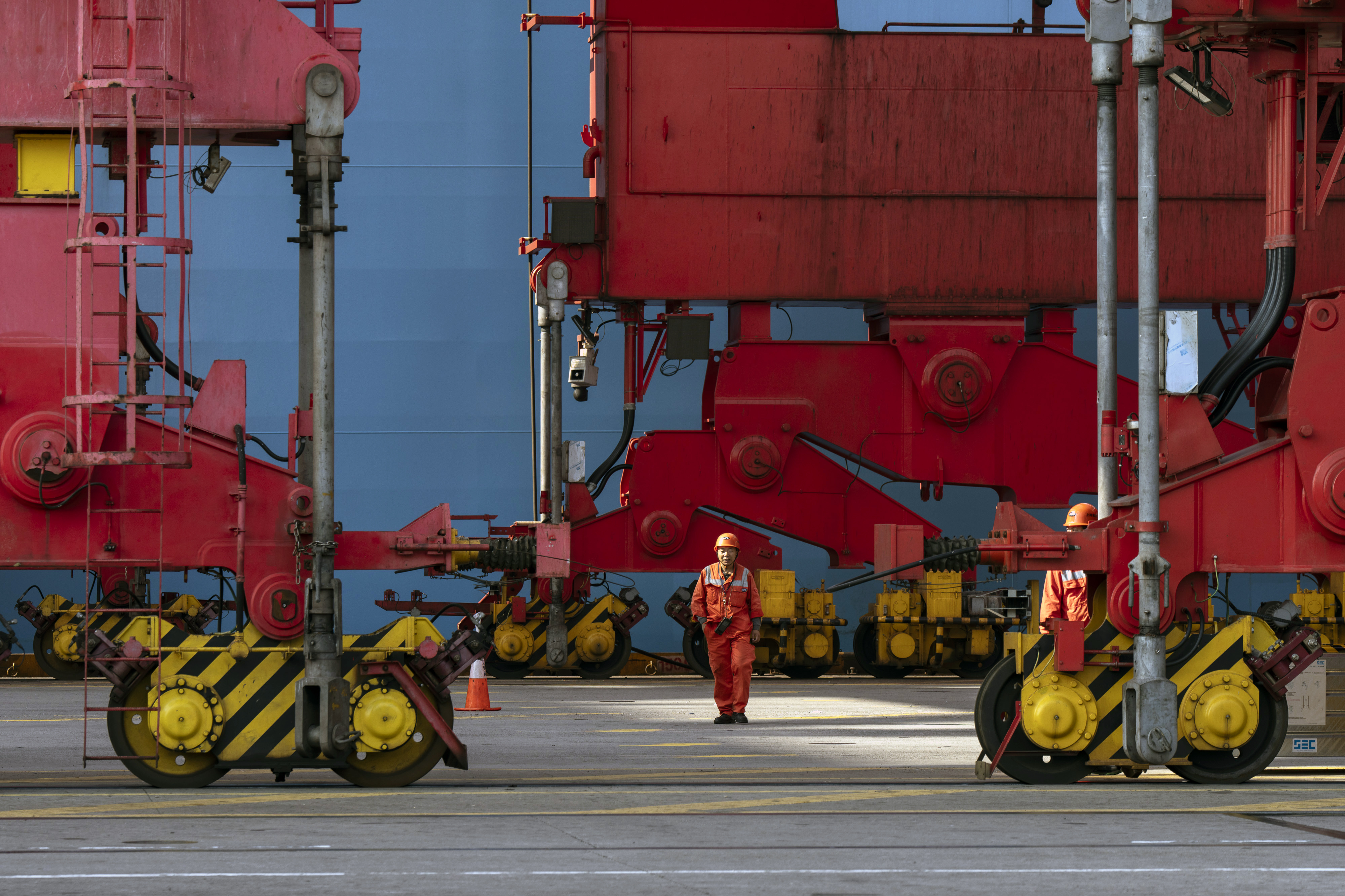 A worker at the Yangshan Deepwater Port in Shanghai, China, on Thursday, Oct. 10, 2024