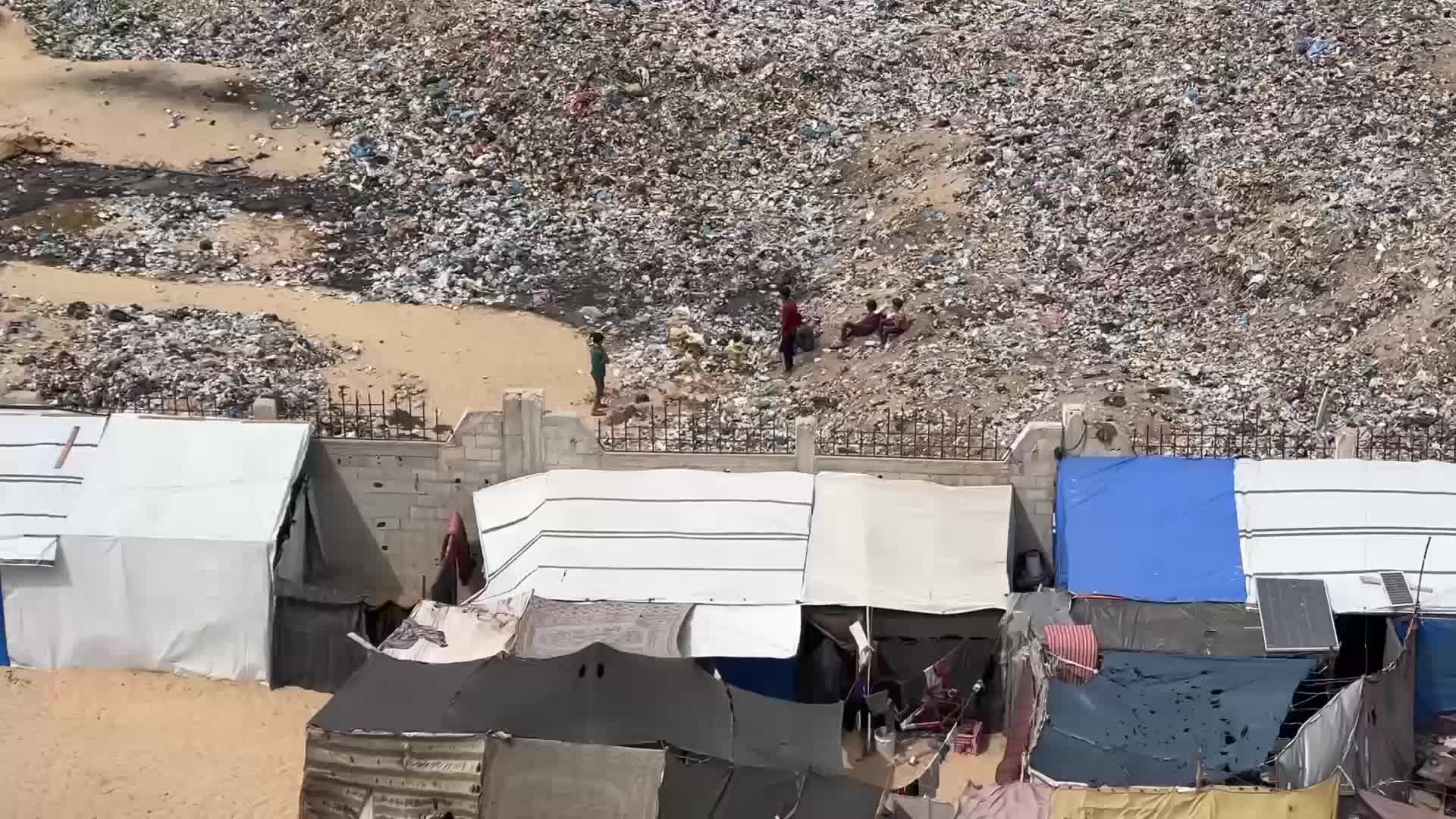 Footage of a tented camp in Al-Mawasi, southern Gaza, where piles of waste can be seen next to people’s makeshift homes