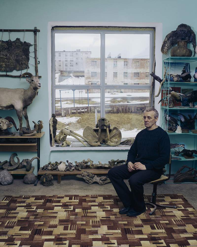 Alexander Gukov&amp;nbsp;inside the small museum of history that he established in Tiksi
