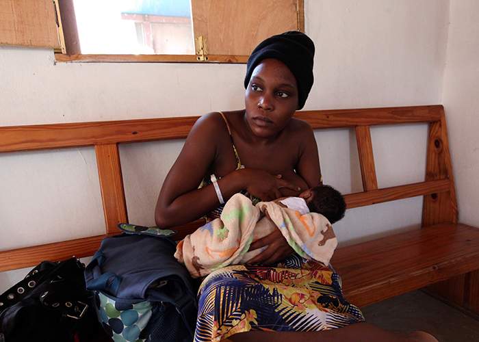 Erda Belizaire, 24, with her first child. She survived pre-eclampsia