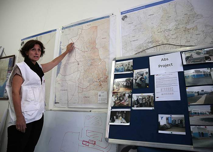 Colette Gadenne of MSF uses a map to make a point about air strikes hitting hospitals at the charity’s office in Sanaa, Yemen AP