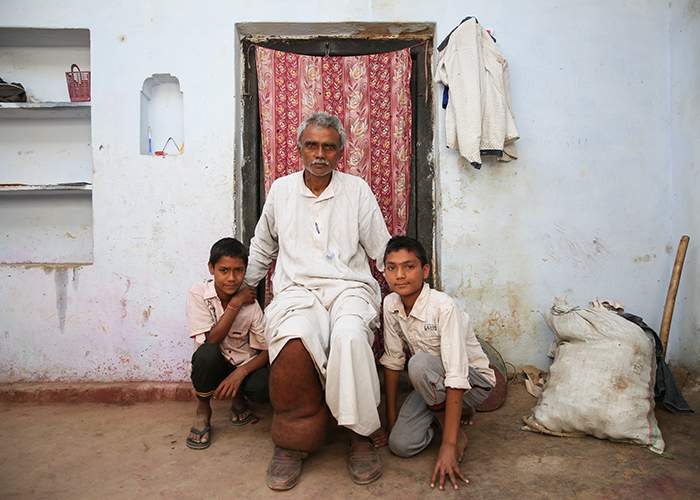 Chaubey with his two sons outside his home&amp;nbsp;
