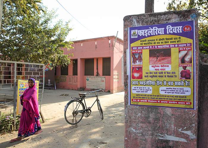 A poster for Filaria Awareness Day on a wall outside a hospital in Bhadohi, Uttar Pradesh